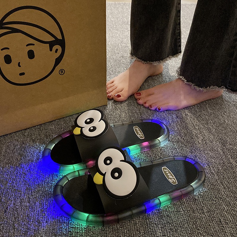 LED Cartoon Slippers – Vibrant Light-Up Sole & Cute Penguin Design – Flexible PVC & Easy Slip-On 🏠